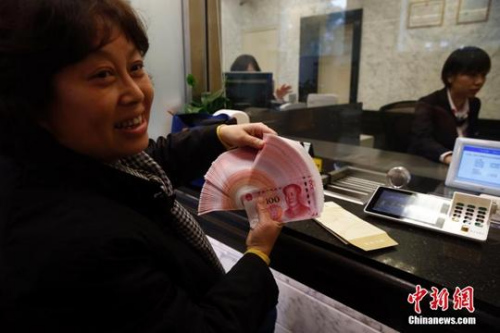 资料图。 <a target='_blank' href='http://www.chinanews.com/'>中新社</a>记者 张浩 摄 多地调整社保缴费基数 上下限标准均出现上调 1